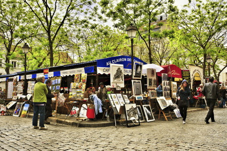 Paris, France - May 14, 2013  Artists in Place du Tertre in Paris, France  Many artists set up their easels each day for the tourists in this famous and picturesque square in Montmartreのeditorial素材