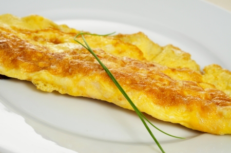 closeup of a french omelette, typical rolled plain omeletteの写真素材
