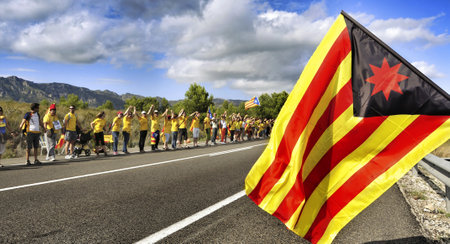 Ametlla de Mar, Spain - September 11, 2013 Partakers in the Catalan Way in Ametlla de Mar, Spain  1,6 million people took part in the human chain supporting the independence of Cataloniaのeditorial素材