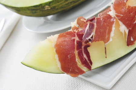 spanish melon con jamon, melon with serrano ham, a typical dish in Spainの写真素材