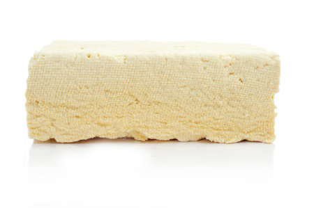 a block of tofu on a white background