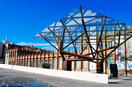 Barcelona, Spain - December 1, 2013  Facade of CaixaForum in Barcelona, Spain  This museum is housed in the former textile factory Casaramona, built by Puig i Cadafalch in 1911のeditorial素材