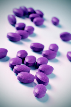a pile of violet pillsの写真素材