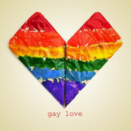 an origami heart painted as the rainbow flagの写真素材