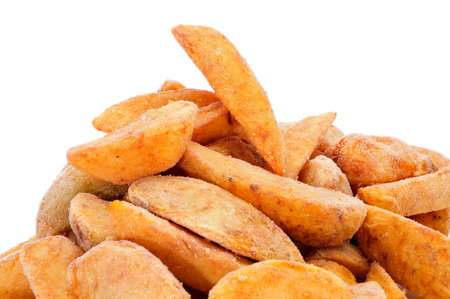 a pile of frozen home fries on a white background