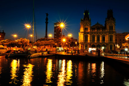 BARCELONA, SPAIN - AUGUST 20: Port Vell and Columbus Monument at night on August 20, 2013 in...