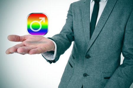 a man wearing a suit with an icon of an app の写真素材