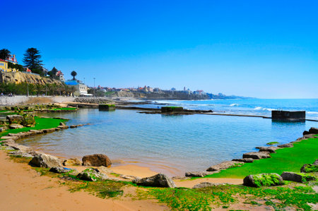 ESTORIL, PORTUGAL - MARCH 19: Natural pools in Praia do Tamariz beach on 19, 2014 in Estoril, Portugal. Estoril is a famous summer vacation location for Portuguese and foreign touristsのeditorial素材