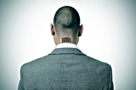 rear view of a businessman with a barcode in his napeの写真素材