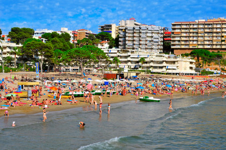 Salou, Spain - August 29, 2014: Vacationers in Capellans beach in Salou, Spain. Salou is a major destination for sun and beach for European tourism with more than 50,000 accommodationsのeditorial素材
