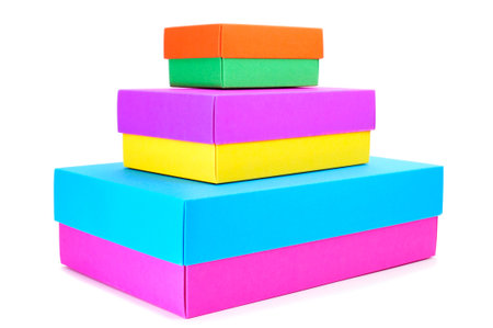 a pile of boxes with different colors on a white background