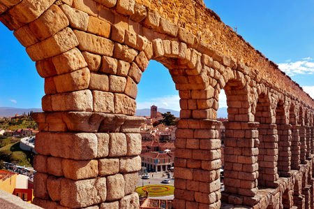 a view of the Roman Aqueduct of Segovia, in Spainの写真素材