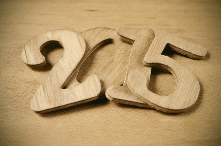 wooden numbers forming 2015, as the new year, on a wooden surfaceの写真素材