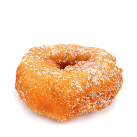 closeup of a rosquilla, a typical spanish donut, on a white backgroundの写真素材