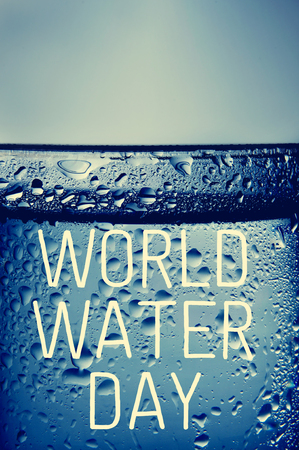 the text world water day written on a glass of cold waterの写真素材