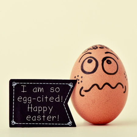 a brown egg ornamented with a funny face with a black flag-shaped signboard with the text I am so...