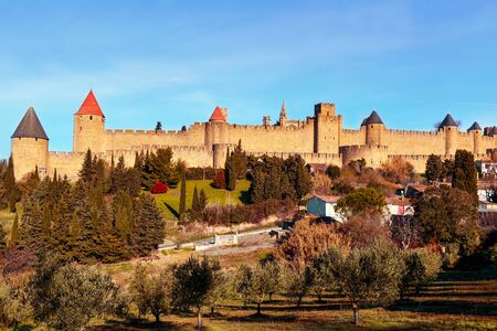 a view of the walls and towers of the Cite de Carcassonne, in Carcassone, Franceの写真素材