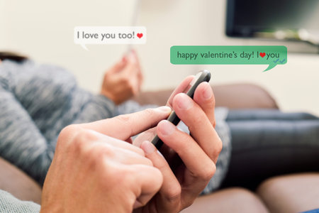 a young caucasian man and a young caucasian woman sending and receiving text messages in their...
