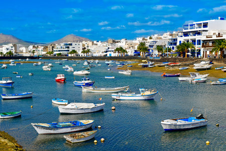 ARRECIFE, SPAIN - NOVEMBER 11, 2016: A view of the bay Charco de San Gines and its characteristics fishing boats in Arrecife, Lanzarote, in the Canary Islands, Spainのeditorial素材