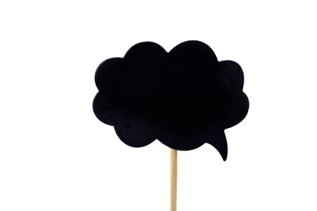 a blank black signboard in the shape of a fuzzy bubble, attached to a stick, against a white backgroundの写真素材