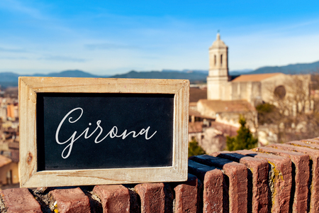closeup of a chalkboard with the word Girona written in it in Girona, Spain, seen from above highlighting the Cathedral on the rightの写真素材