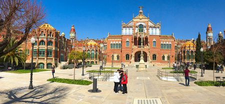 BARCELONA, SPAIN - MARCH 18, 2017: Visitors at the modernist complex of the Hospital de Sant Pau in...