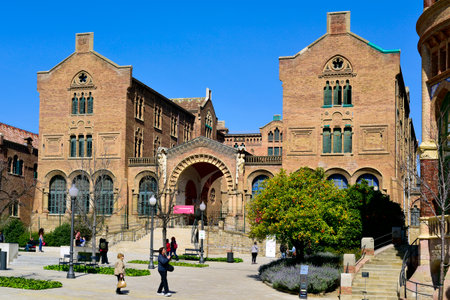 BARCELONA, SPAIN - MARCH 18, 2017: Visitors at the modernist complex of the Hospital de Sant Pau in Barcelona, Spain, which is part of the UNESCO World Heritage Site Works of Domenech i Montanerのeditorial素材