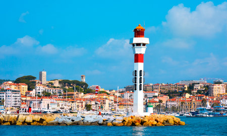 a panoramic view of the Vieux Port, the Old Port of Cannes, France, and Le Suquet district, the old town, in the backgroundのeditorial素材