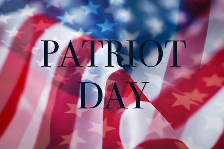 multiple exposures of different pictures of the flag of the United States of America, and the text Patriot Dayの写真素材