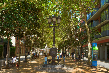 HOSPITALET DE LLOBREGAT, SPAIN - SEPTEMBER 2, 2017: A view of the Rambla Just Oliveras promenade in...