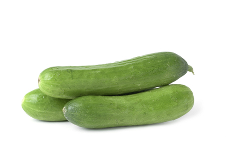 some raw cucumbers on a white backgroundの写真素材