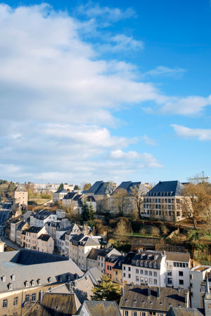 a view of the Grund Quarter in Luxembourg City, Luxembourg, with its typical houses with black slate roofsのeditorial素材