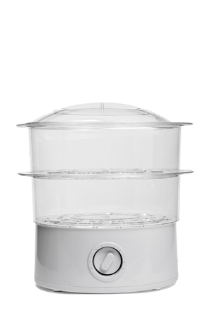 closeup of a white electric steam cooker on a white backgroundの写真素材