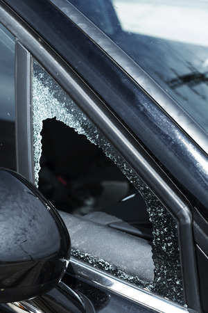 closeup of the broken vent glass of a carの写真素材