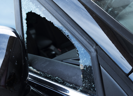 closeup of the broken vent glass of a carの写真素材
