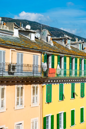 a view of the old buildings of the old town of Bastia, in Corsica, France, with its characteristic natural slate rooftopsのeditorial素材