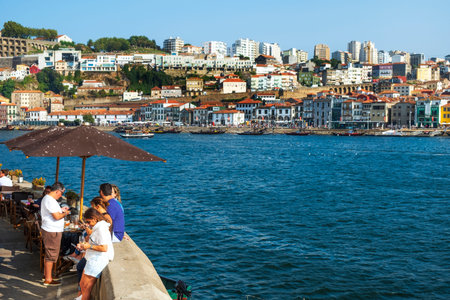 VILA NOVA DE GAIA, PORTUGAL - AUGUST 29, 2018: A view of the Douro River since Porto, in Portugal,...