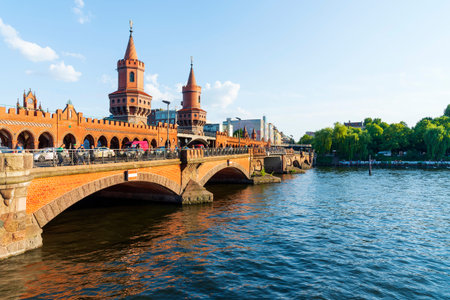 BERLIN, GERMANY - MAY 25, 2018: A view of the famous Oberbaum Bridge over the Spree River in Berlin,...