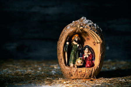the holy family, the child jesus, the virgin mary and saint joseph, in a rustic nativity scene...