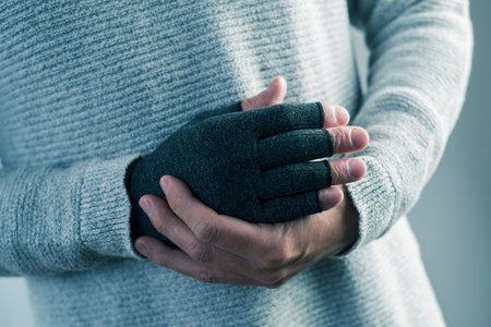 closeup of a caucasian man wearing a compression glove