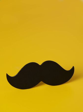 A black moustache on a yellowの写真素材