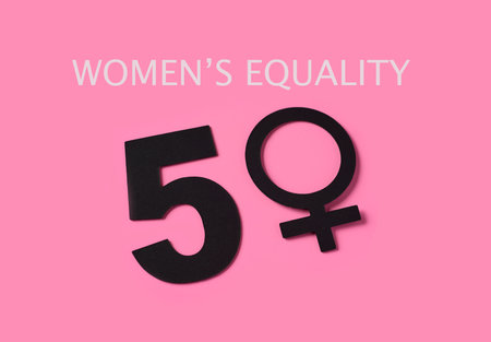 the text womens equality and the number 50, where the zero is a female gender symbol, depicting the...