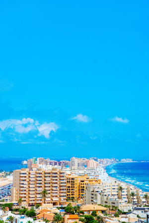 a view over La Manga del Mar Menor, in Murcia, Spain, with the Mar Menor lagoon on the left and the...