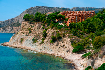 a panoramic view over the Cala La Manzanera beach in Calpe, in the Valencian Community, Spainの写真素材