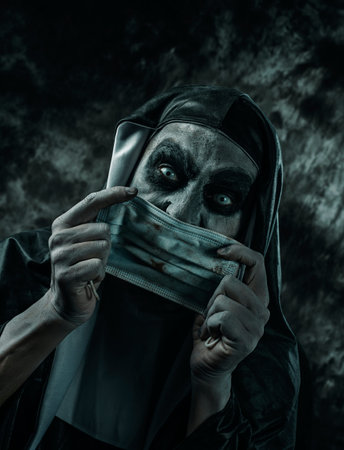 closeup of a scary evil nun, in a typical black and white habit, putting on or taking off a dirty...