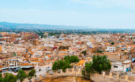 an aerial view over the old town of Lorca, in the Region of Murcia, Spainの写真素材