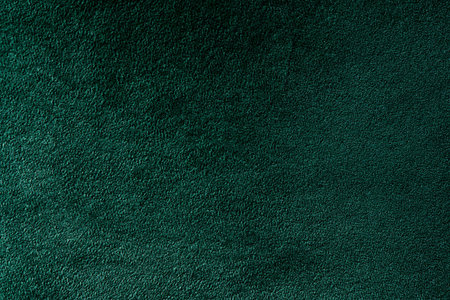 closeup of an elegant dark green velvety, to be used as backgroundの写真素材