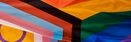 closeup of an intersex-inclusive progress pride flag in a panoramic format to use as web banner or headerの写真素材
