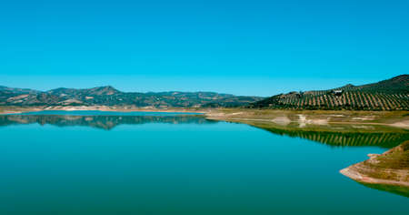 a panoramic view over the Iznajar reservoir, in Andalusia, Spain, in a sunny spring dayの写真素材