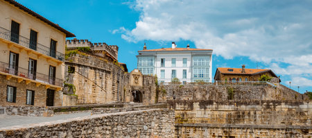a view of the gateway to the fortified old town of Hondarribia, in the Basque Country, Spain, in a...